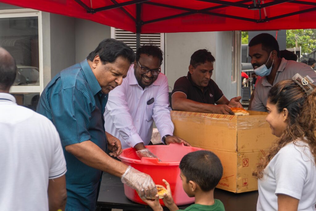 IDEAL GROUP SHARES THE SPIRIT OF POSON THROUGH A COMMUNITY SEENI SAMBOL BUN DANSALA